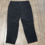 Tangerine 3:$25  capri leggings with cute cut outs down outside of each calf. Photo 4