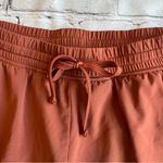 Gilly Hicks  Running Shorts Small Lined Zip Pockets Womens Rust Athletic Work Out Photo 9