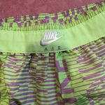 Nike Purple and Green Athletic Shorts with Curved Hem Photo 2
