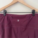 Sweaty Betty  Cropped Athletic Leggings Back Zipper Pocket Mesh Logo Stretch EUC Photo 5