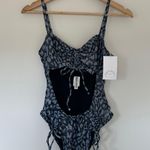 Dippin' Daisy's Dippin Daisy’s Hideout One Piece Photo 4