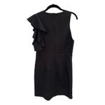 Lucy Paris  black dress with pearl embellished. Size Extra Small Photo 1