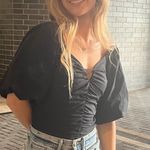 Kittenish Black Puff Sleeve Bodysuit Photo 0