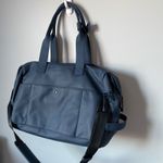 Calpak Hue Duffel Laptop Travel Bag in Atlantic Blue Color Faux Photo 4