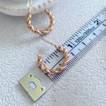 Urban Outfitters Chunky twisted open hoop earrings Photo 1