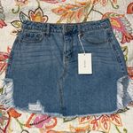 Cello  women's medium denim mini skirt distressed edges light blue zip & button Photo 0