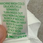 Lilly Pulitzer  Martina Sleeveless Golf Polo Shirt Meryl Nylon Pique UPF White LG Photo 4