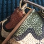 Tous  Crossbody Handbag Multi~Color Front Zipper Pocket Logo Charm Tan Green Rust Photo 11