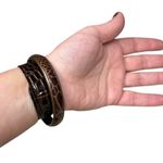 Set of Two Leather Bracelets with Star and Giraffe Print Design Photo 2