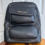 Adrienne Vittadini  black faux leather embossed backpack Photo 0