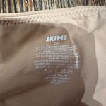 SKIMS  NWT FITS EVERYBODY FULL COVERAGE BACK SMOOTHER BRA 32DD Clay Photo 2