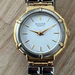 Bulova  Ladies Watch Two-Tone Bracelet Case Sparkling Silver Dial Gold-Tone Hands Photo 1