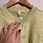 Lululemon NWT  Heavyweight Cotton T-Shirt Bodysuit
Finch Yellow- Size Small Photo 5