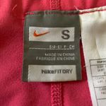 Nike Super cute pink pleated active skirt, excellent condition, size small Measurements: Waist: side to side 14-18 inches Length: waistband to bottom 15 1/2 inches Photo 7