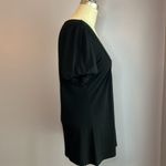 L8ter  black top crochet lace neckline fitted bust flares out at the hips Size M Photo 3