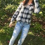 American Eagle Low Waisted Ripped Jeans  Photo 0