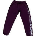 PINK - Victoria's Secret VS PINK purple jogger sweatpants with bedazzled logo detail Photo 0