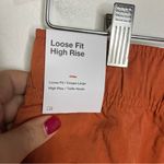Nike  loose fit high rise cargo shorts orange rust women’s size small new‎ casual Photo 7