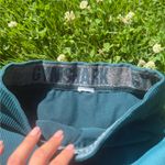 Gym shark draw string. Super cute. no size, but definitely xs/small Photo 1