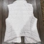Aeropostale Stay warm and stylish with this sleek white puffer vest. Perfect for layering in cooler weather. Photo 2