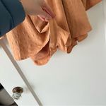 Le lis  Collection Orange Textured Long Sleeve Button Cutout Romper Small NWT Photo 1