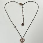 Juicy Couture heart-shaped pink rhinestone peace sign on antique gold necklace Photo 0