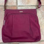 Tumi crossbody travel bag/purse Photo 1