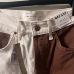 Top Shop Jeans that are a brown and off white color size women’s 28! Photo 1