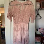 Rosette  pink romper Photo 1