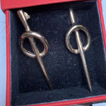 UNO de 50 Gold Tone Knot Earrings Photo 0