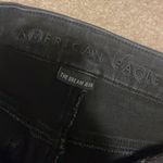 American Eagle Black skinny jeans with holes Photo 4