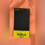 Xersion Version Neon Apricot Cover. Ties at hemline. Size M Photo 9