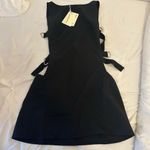 Peppermayo Black Cut Out Tie Front Sheath Dress Photo 0