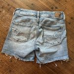 American Eagle distressed light wash size 4 midi shorts Photo 1