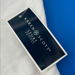 Karen Scott  White Vest Photo 1