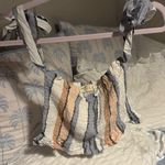 Ocean Drive  beachy pink and blue ruffled top with bow shoulder ties! Photo 0