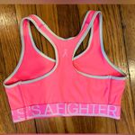 Under Armour Women’s Neon Pink  Unlined Racerback Sports Bra Photo 0