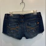 Almost Famous Dark Blue Jean Shorts with Tan Stitching Photo 1