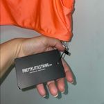 Pretty Little Thing 𝅺 Orange Sports Bra Photo 9