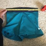 Nike Pro woman’s size XS teal and navy shorts Photo 4