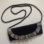 Vintage black beaded bag with pink, blue, and green ruffle trim Photo 0