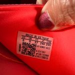 Adidas ADILETTE COMFORT K sandals pink orange super soft comfy light weight NWT New with tag Same day shipping Smoke and pets free Get ready to step up your style with these Adilette Comfort K sandals! These sandals are perfect for those who want to look fashionable while staying comfortable. With a super soft and lightweight design, these sandals are perfect for all-day wear. The pink and orange striped pattern adds a pop of color to your outfit, making them a great choice for any occasion. These sandals come in a UK shoe size 5, US shoe size 5, and EU shoe size 37. The synthetic upper material and comfort slide product line ensure that your feet will stay cool and comfortable no matter where you go. Don't miss out on the chance to add these stylish and comfortable sandals to your shoe collection! Photo 6