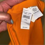 Aerie one piece orange cheeky open back swim suit 🆕 size medium Photo 3