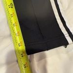 Adidas  track pants white stripes and a slim tapered leg women’s S long Photo 14