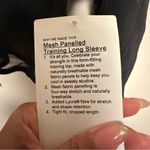 Lululemon NWT Mesh Panelled Training Long Sleeve Shirt
Black- Size 8 Photo 6