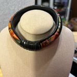 Very cute bracelet. It appears that it’s wrapped in leather at one end.​ Photo 0