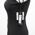 Betsy and Adam . Arielle Scuba Crepe Ruffle Slit Gown. Photo 11