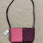 Michael Kors  Pink and Burgundy Women's Cross-Body Bag Photo 1