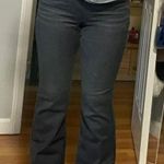 American Eagle Next Level Stretch Black Curvy Super High-Rise Flare Jeans Photo 6