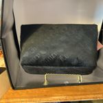 Juicy Couture new tags. I cannot open up the inside or it will cut the tag off. Photo 1